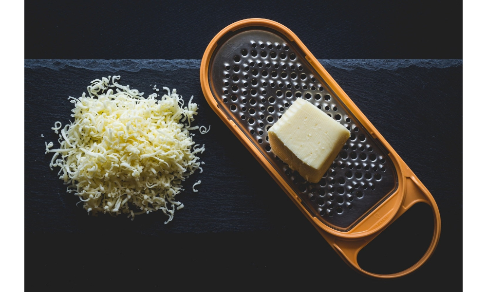 How Does the Choice of Shredded Cheese Impact the Texture and Flavour of Dishes Like Burrito Bowls?